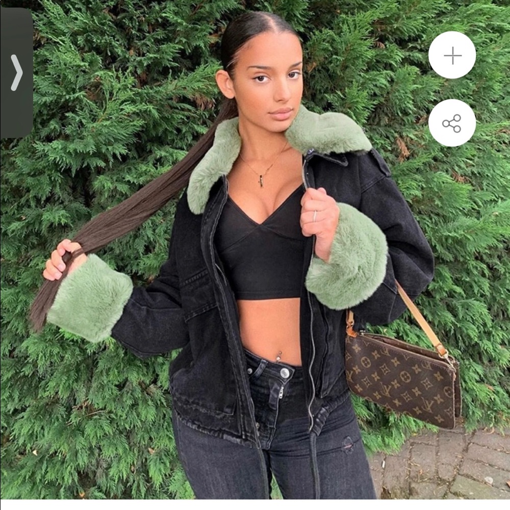 Black jacket with green fluff